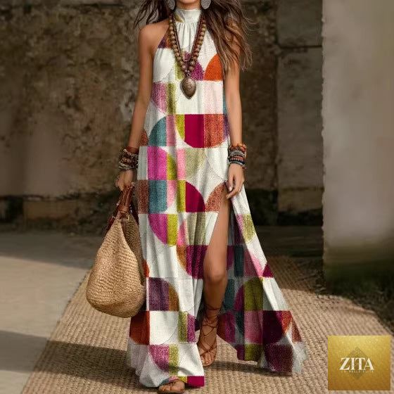 Women's printed halterneck split maxi dress by Zita La Belle Elite, sleeveless, loose fit with vibrant floral pattern.