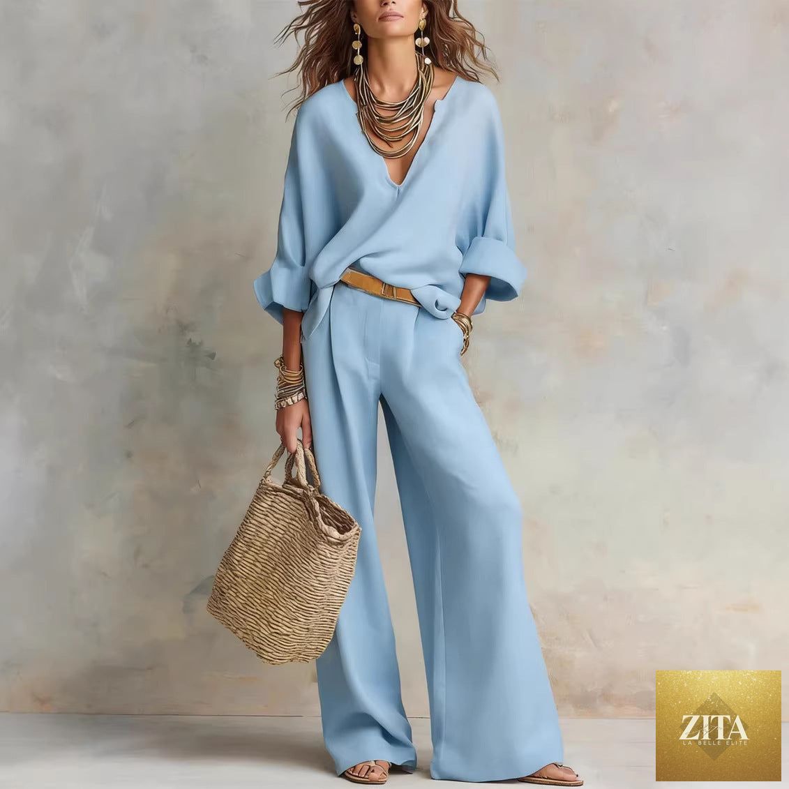 Women's casual linen vacation set by Zita La Belle Elite, includes three-quarter sleeve top and full-length pants, in light, breathable fabric.