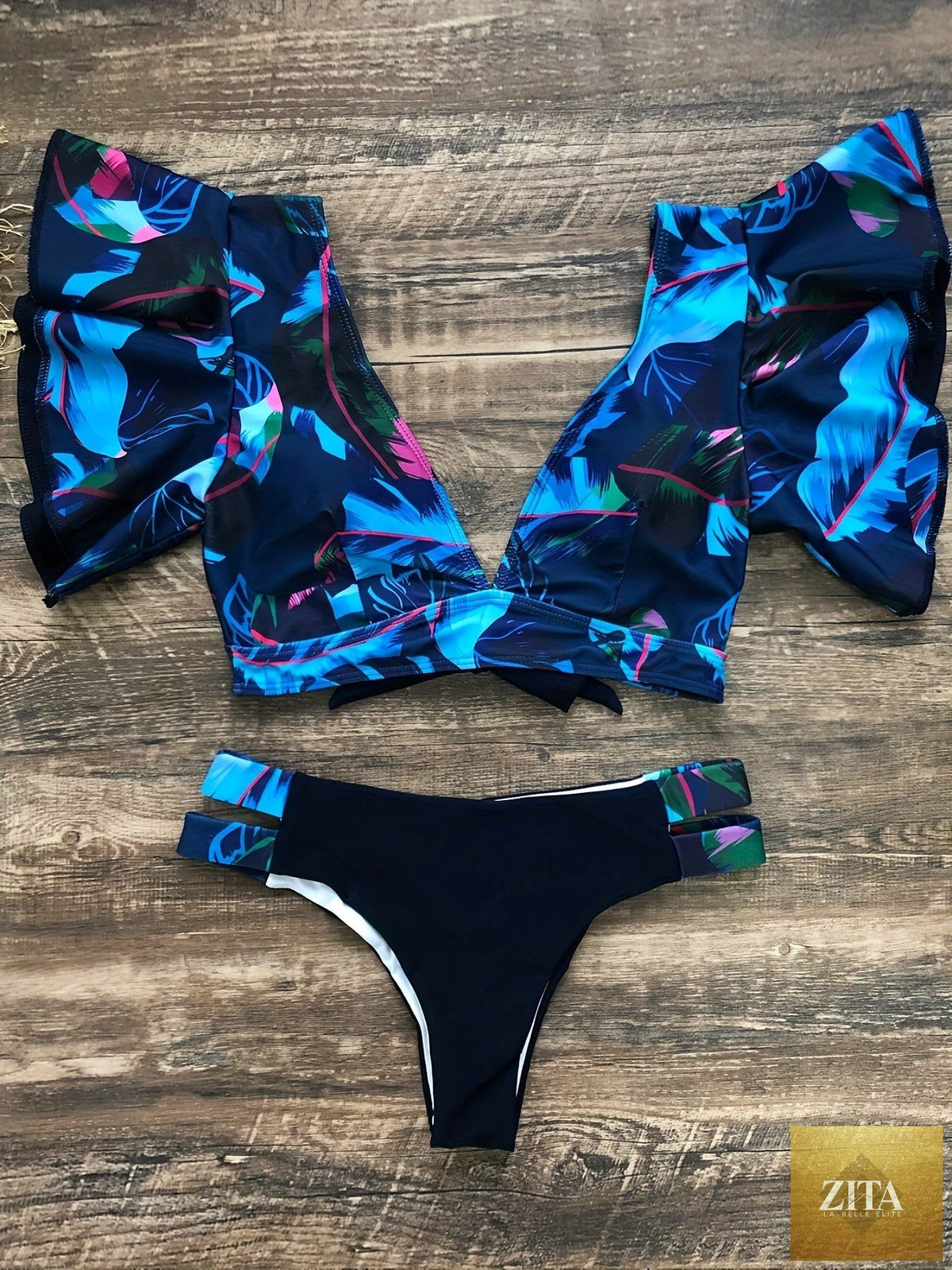 Stevvex Bloom Day Ruffle Bikini Set with plant print, V-neck, tie-back, and high-stretch ruffle trim, women's two-piece swimwear.