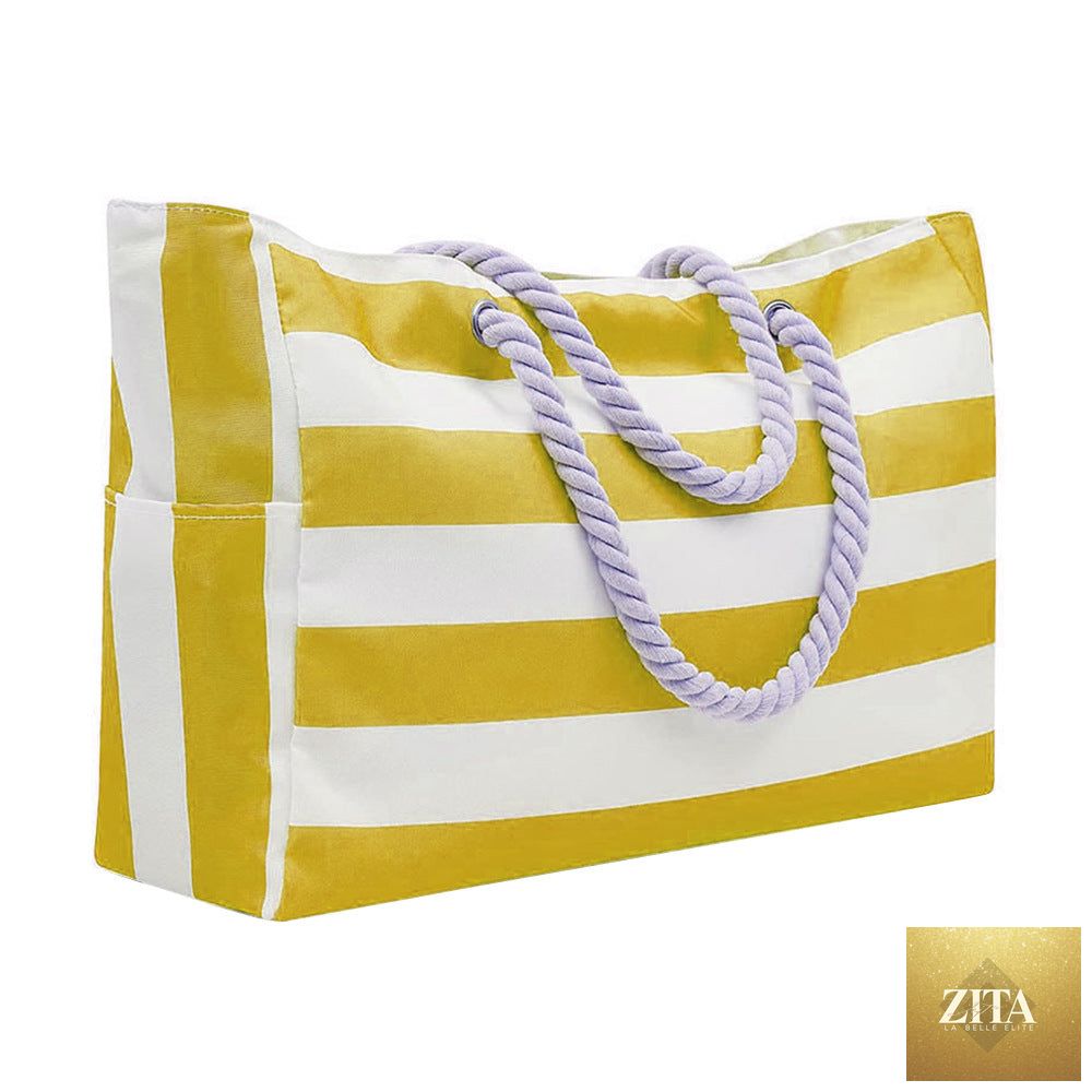 Embroidered striped beach bag with large capacity, Social Buzz eSIMs brand, showing colorful woven fabric and sturdy handles.
