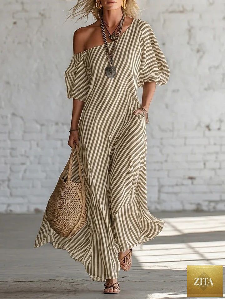 Women's striped off-shoulder midi dress by FitiqueFit, featuring elegant design and stylish stripes perfect for casual or semi-formal wear.