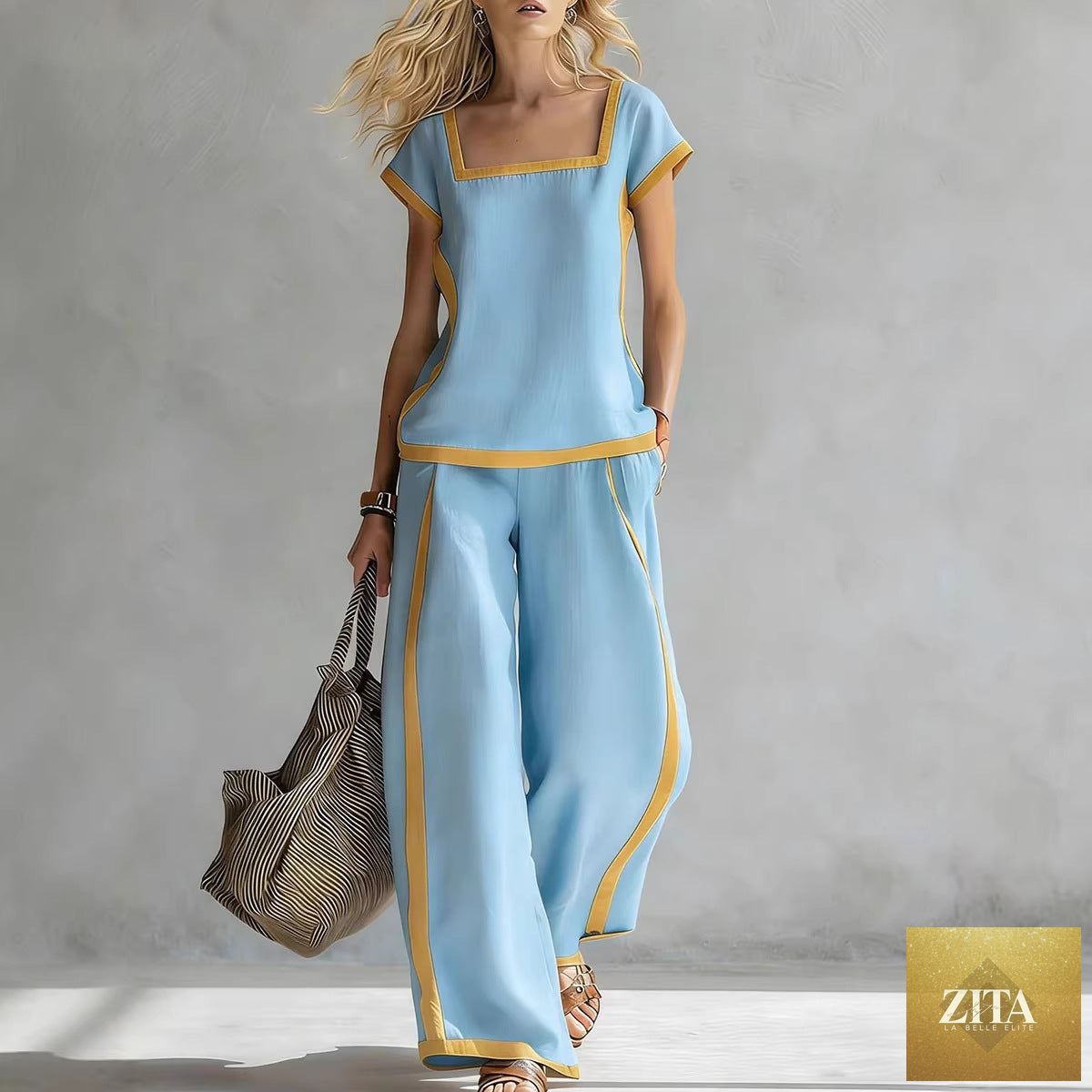 Zita La Belle Elite two-piece set with a solid color shirt and wide-leg trousers, showcasing a stylish, coordinated outfit.