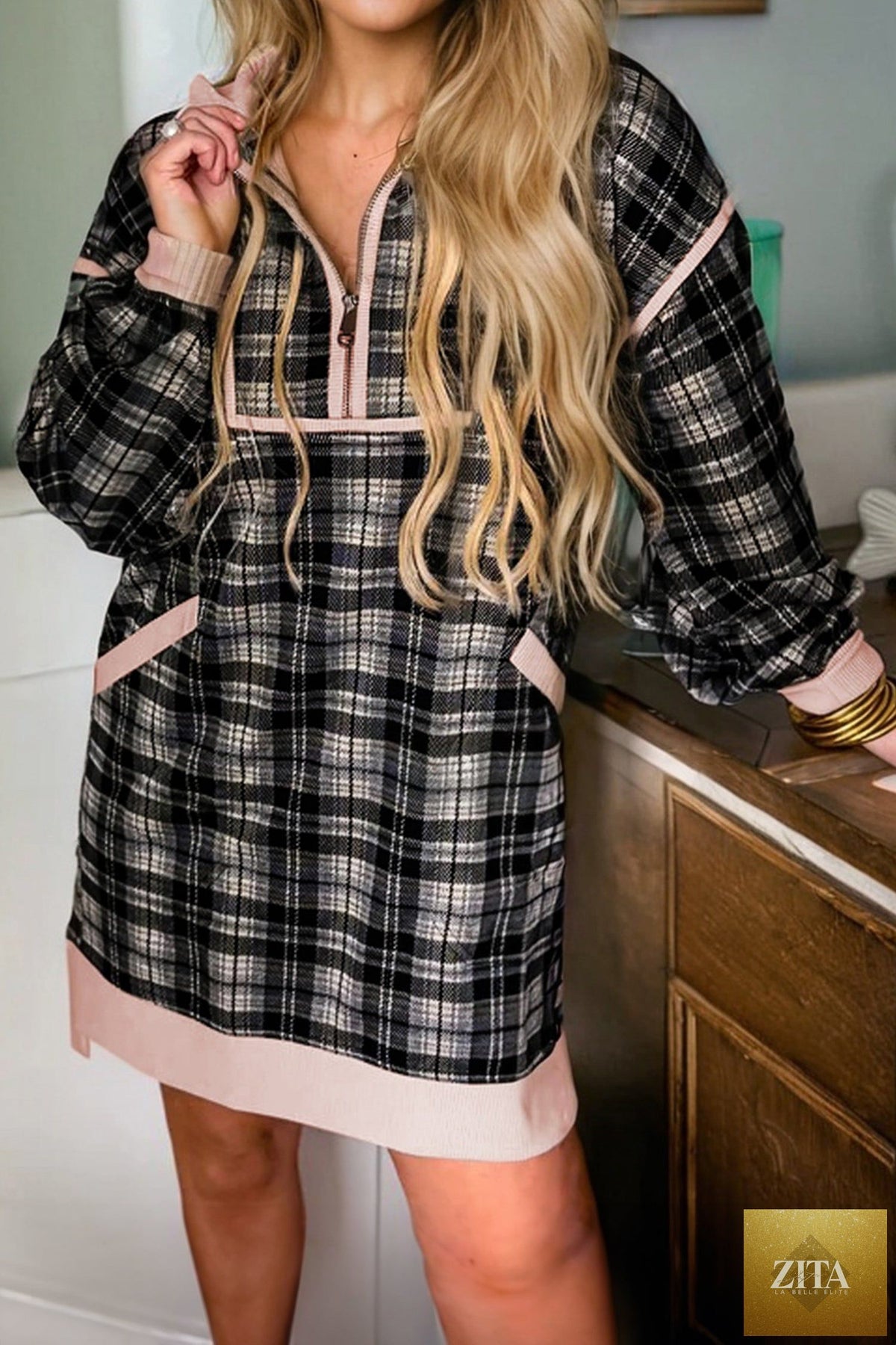 Black plaid polo collar zip-up mini dress with contrast trim, long sleeves, from Wild and Free Boutique.