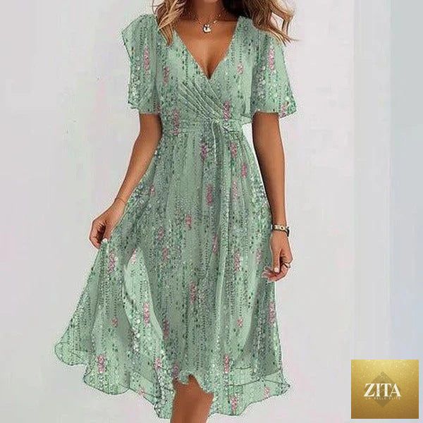 Floral print FitiqueFit A-line midi dress with V-neck, short sleeves, and a feminine silhouette.