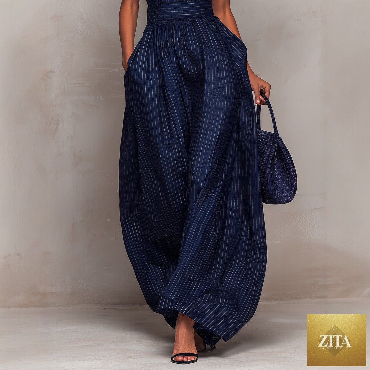 Women's sleeveless striped wide-leg jumpsuit by Zita La Belle Elite with pockets, casualwear style, shown on a model.