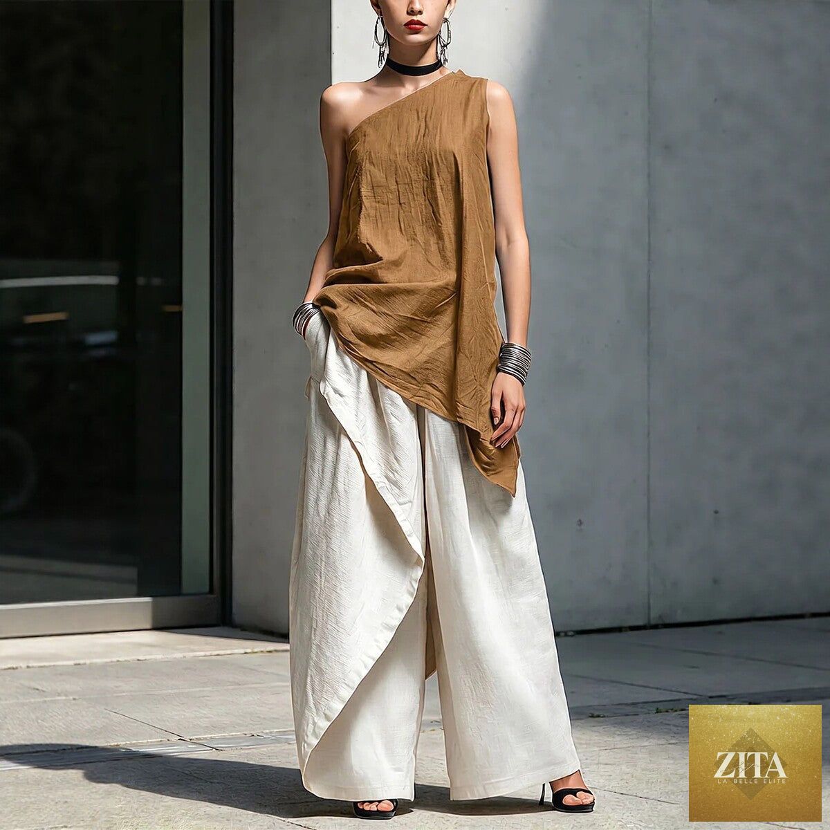 Women's one-shoulder asymmetric sleeveless top by Zita La Belle Elite, featuring a stylish and modern design.