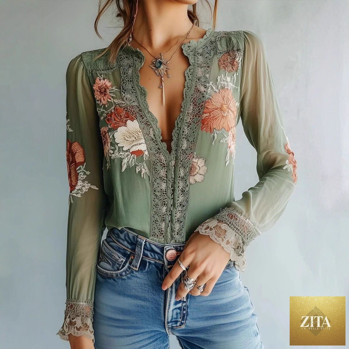 Women’s V-neck floral print blouse by Zita La Belle Elite, casualwear top with colorful floral design and relaxed fit.