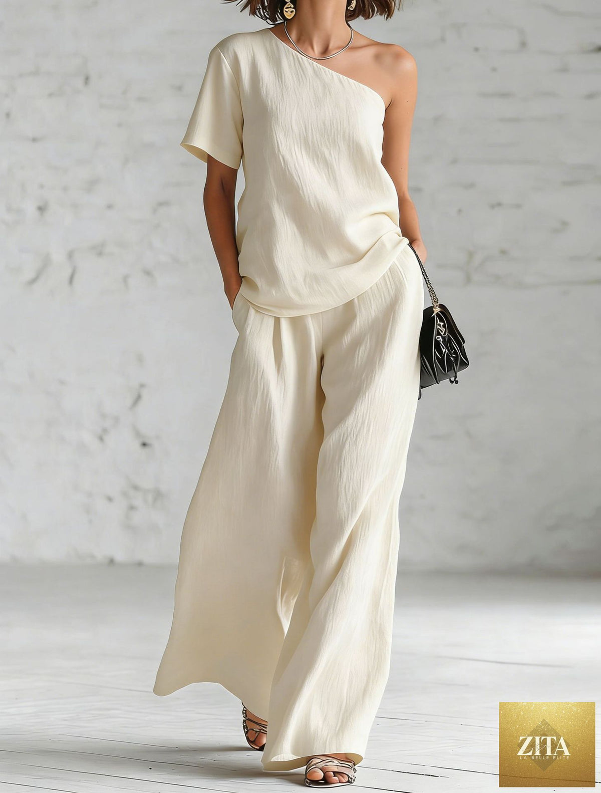 Zita La Belle Elite women's wide-leg pants and top set in casualwear, featuring a matching three-quarter sleeve top and wide-leg trousers.