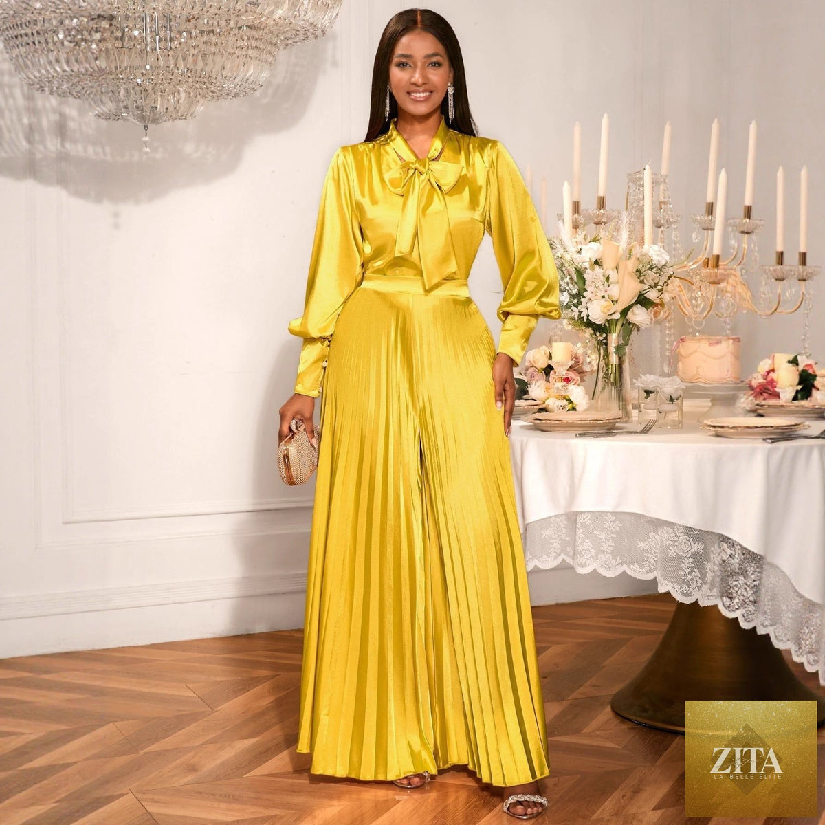 Elegant pleated wide-leg trousers suit with a sexy V-neck bow long sleeve top, featuring stylish pleats and a sophisticated fit.