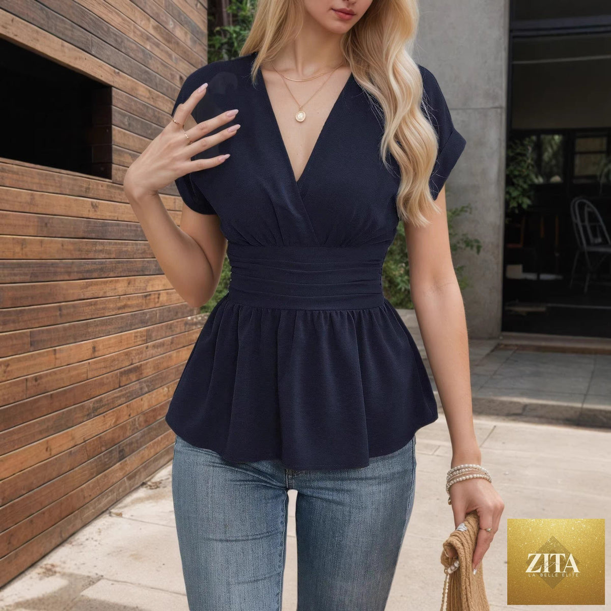 Women's fitted V-neck peplum top with ruched waistband, cap sleeves, and pleated hem by FitiqueFit.