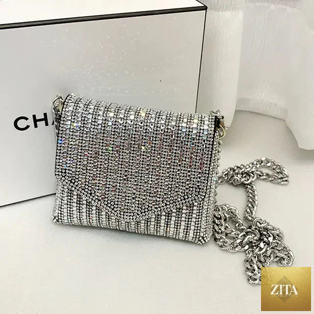 Mini rhinestone bling chain crossbody purse for women, stylish evening bag with sparkling embellishments and chain strap.