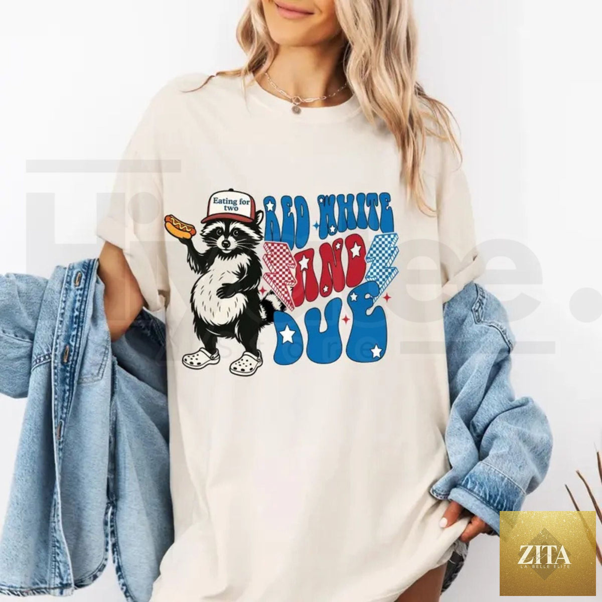 Red, white, and blue 4th of July pregnancy T-shirt by Hiyatee featuring humorous American Mama design.