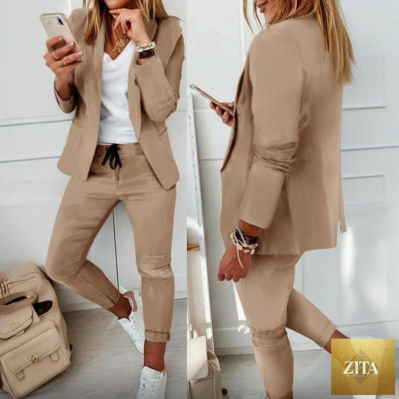 Women's casualwear blazer and drawstring pants suit set by FitiqueFit, featuring a notch-lapel blazer and matching relaxed pants.