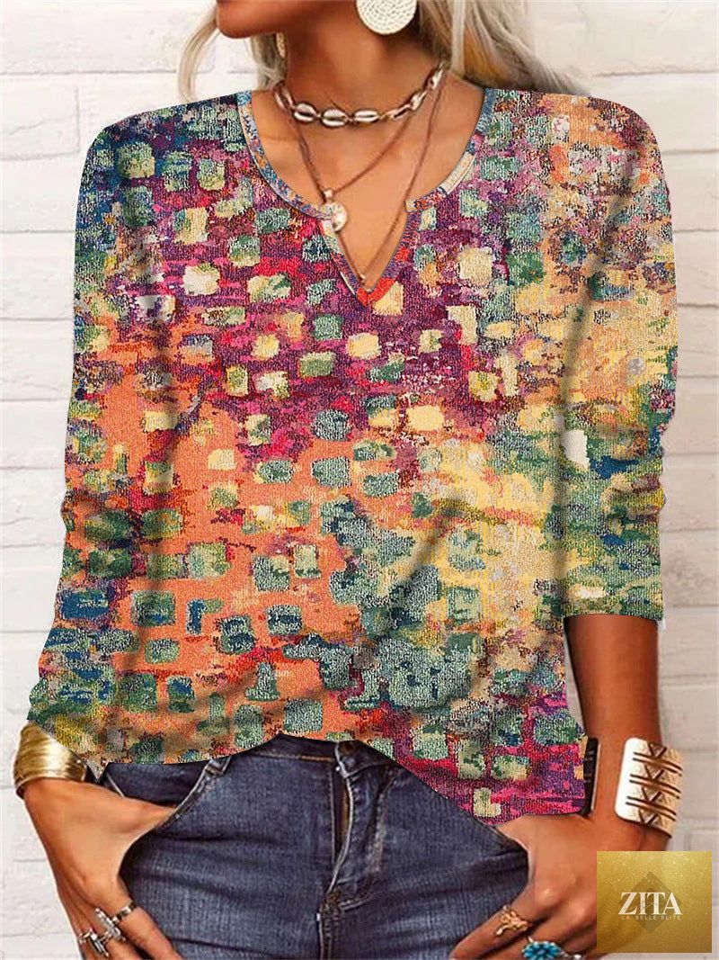 Women's ethnic print V-neck long sleeve casual T-shirt by Zita La Belle Elite with loose fit and colorful pattern.