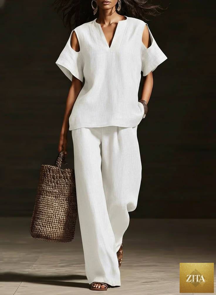 Zita La Belle Elite two-piece V-neck short sleeve top and straight-leg pants set with ripped details and pockets in solid color
