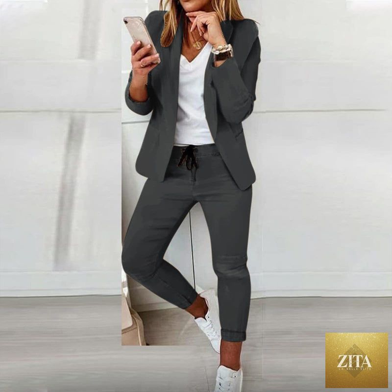 Women’s casual blazer and drawstring pants suit set by FitiqueFit, featuring a notch-lapel blazer and comfortable matching pants.