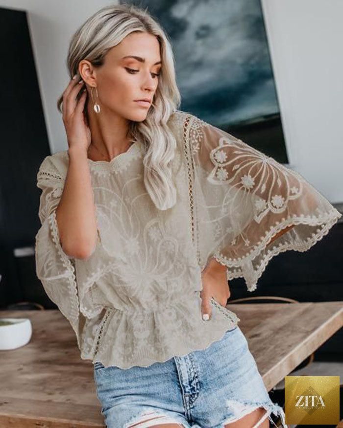Women’s short sleeve batwing casual top with lace trim from FitiqueFit, showcasing a relaxed fit and elegant lace detailing.