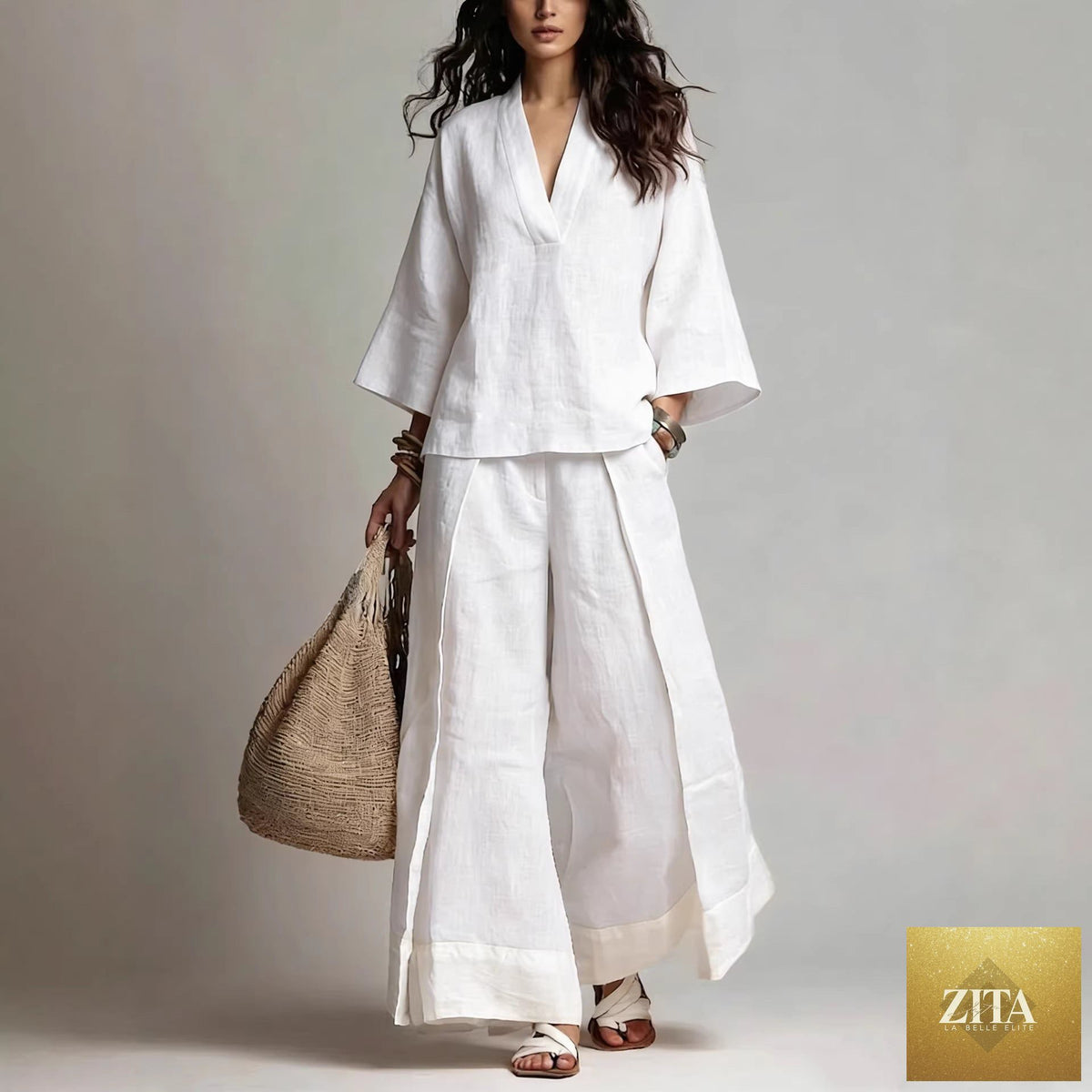 Women's cotton-linen V-neck shirt and wide-leg pants set by FitiqueFit, featuring a relaxed fit and 3/4 sleeves.
