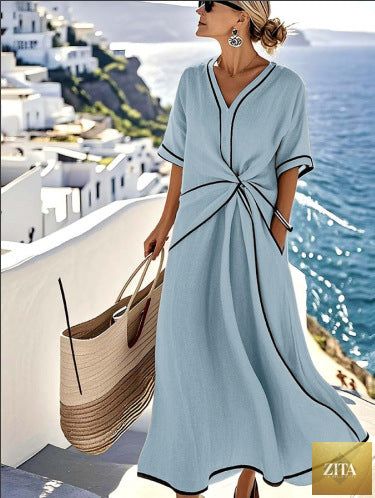Zita La Belle Elite striped print maxi dress with short sleeves, perfect for beach vacation, flowing fabric and vibrant pattern