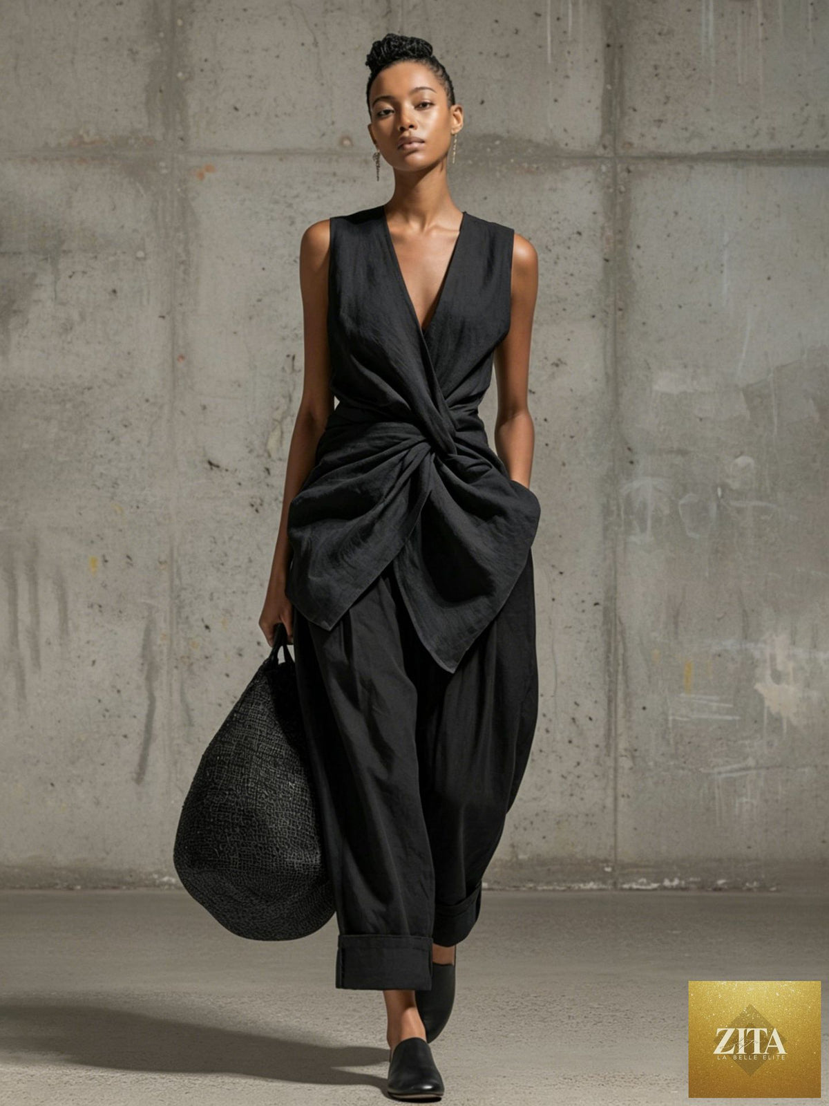 Women's casualwear set by FitiqueFit featuring a tie-front V-neck sleeveless top and wide-leg pants, displayed on a mannequin.