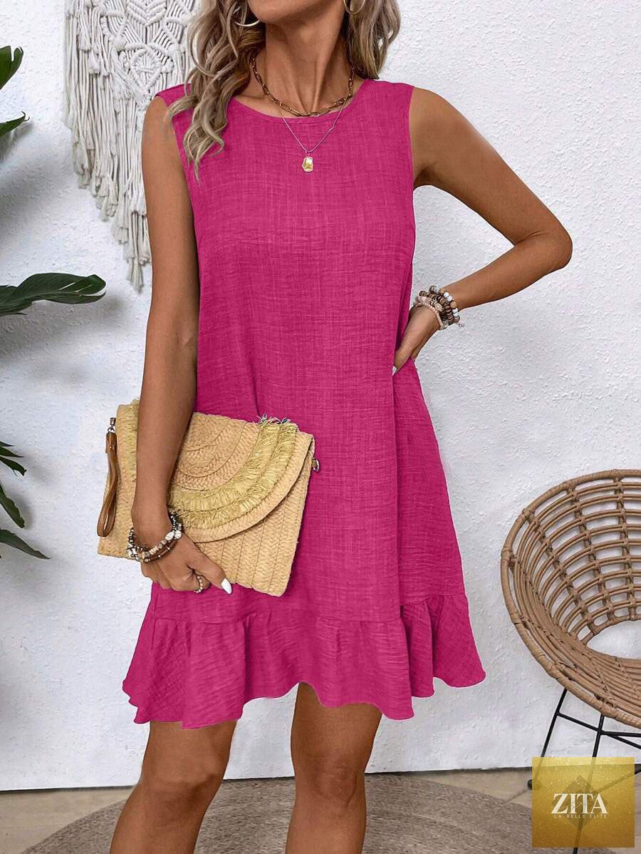 Women's ruffle lace-up mini dress by FitiqueFit featuring short sleeves, loose fit, and beach-ready style.