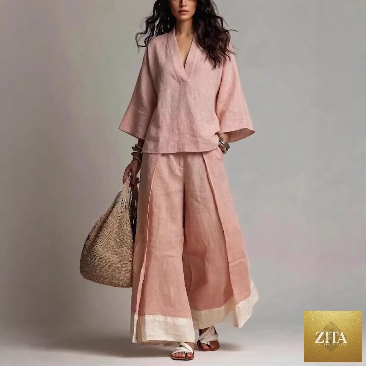 Women's cotton-linen V-neck 3/4 sleeve shirt and wide-leg pants set by FitiqueFit, featuring a relaxed fit and natural fabric texture.