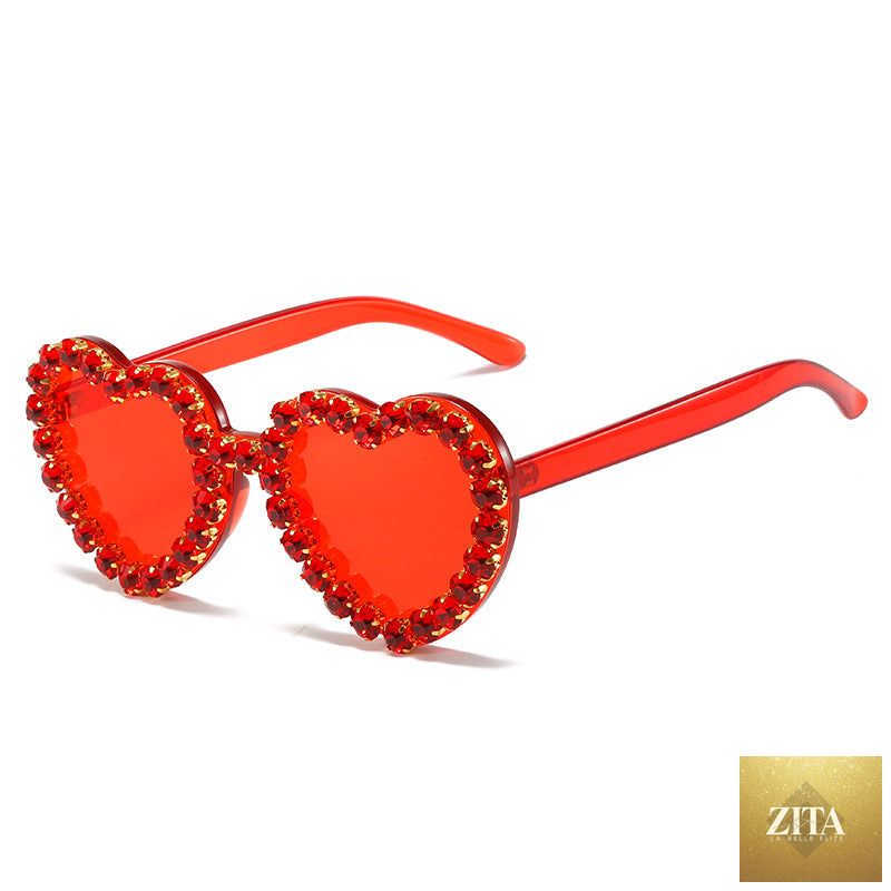 Peach heart-shaped rhinestone sunglasses by FitiqueFit, Y2K INS style, with trendy heart-shaped lenses and rhinestone details.