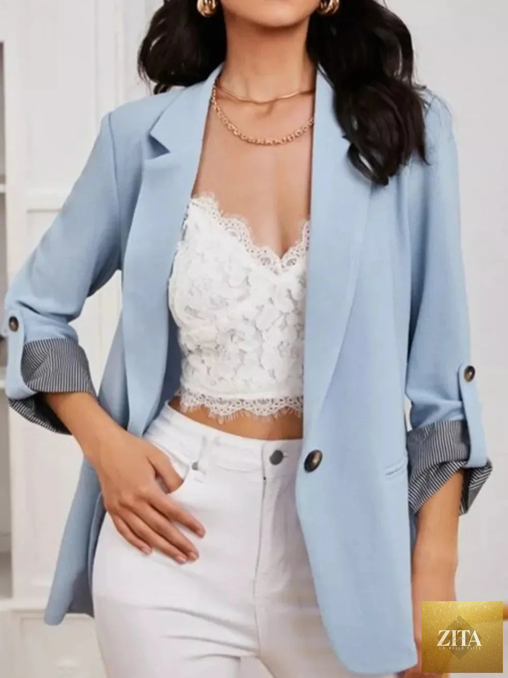 SITRA blazer with lapel collar and roll-tab sleeves, tailored fit in a stylish professional design, front view.