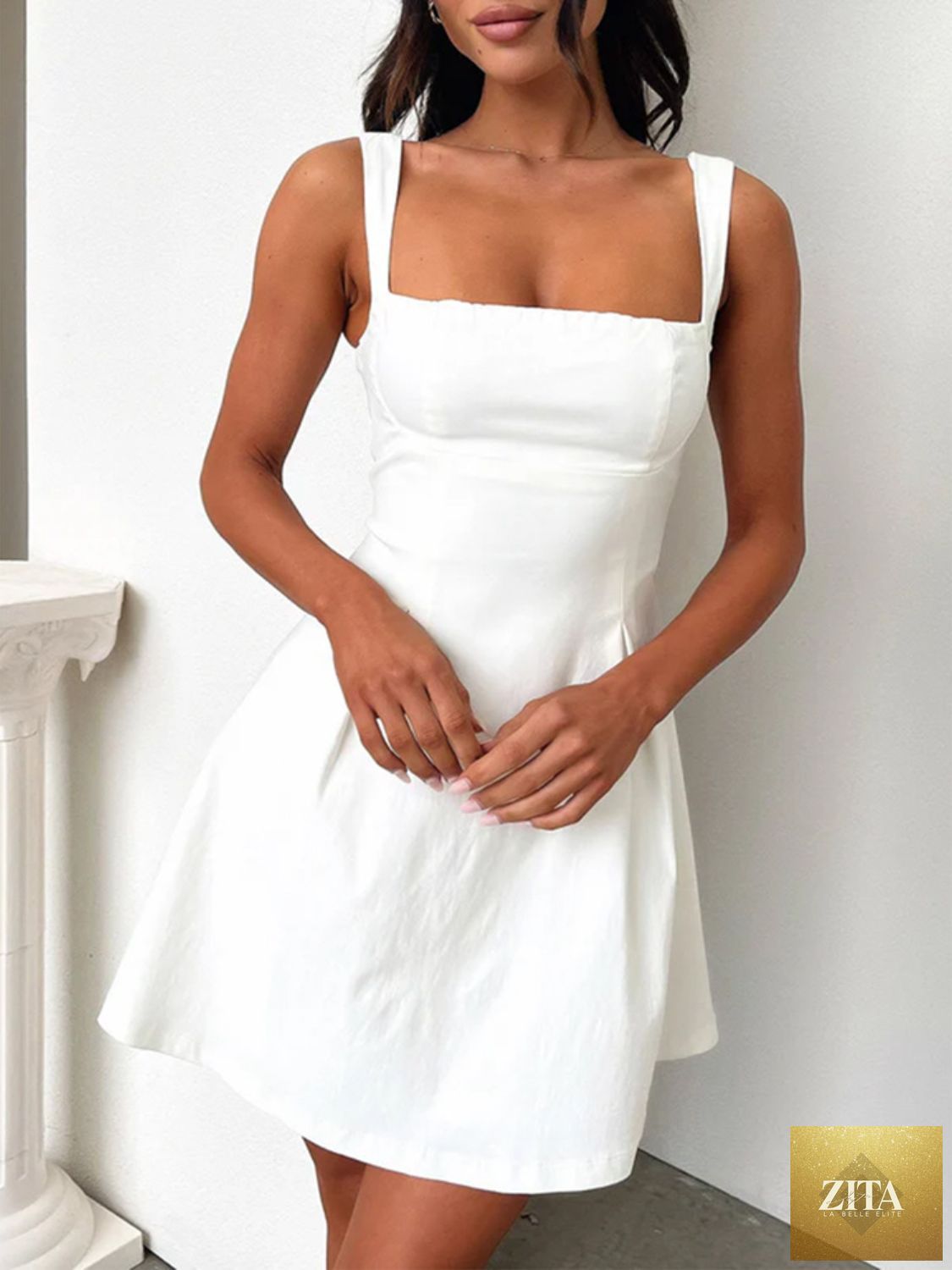 Dark blue bow-back square neck mini dress by Stevvex featuring a feminine fit and flattering silhouette for girls.