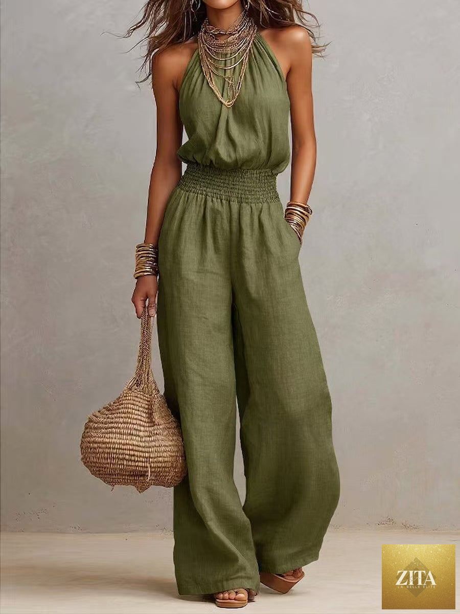 Women's black halter-neck backless wide-leg jumpsuit by FitiqueFit, featuring a stylish solid color street style design.
