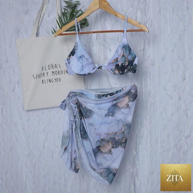 Stevvex 3-piece women's bikini set with high-cut swimsuit, halter top, wrap skirt, lace-up strings, backless design, and triangle cut.