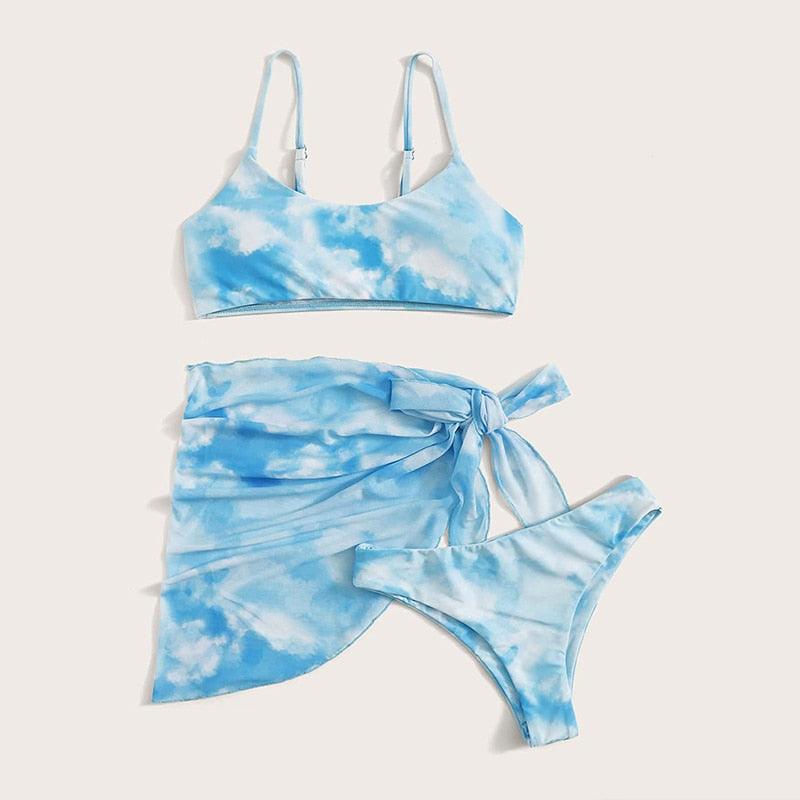 Stevvex 3-piece women's bikini set with high-cut design, halter top, wrap skirt, lace-up details, and backless style for swimming.