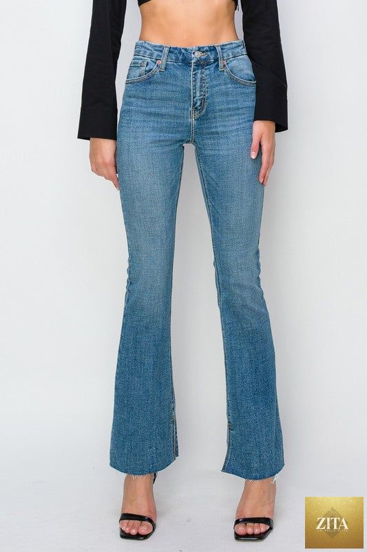 Artemis Vintage paisley high-rise flare jeans in reg and plus sizes, showing the detailed paisley pattern and wide flare leg.