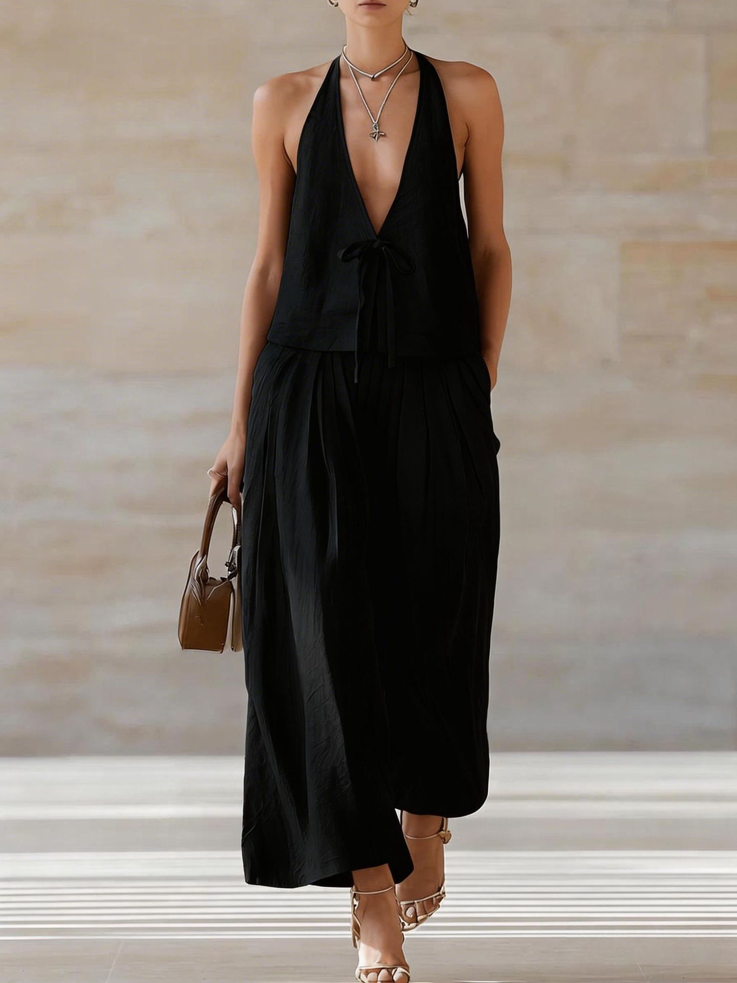 Women's sleeveless vest and wide-leg pants casualwear set by FitiqueFit, featuring lace-up details in a stylish, comfortable design.