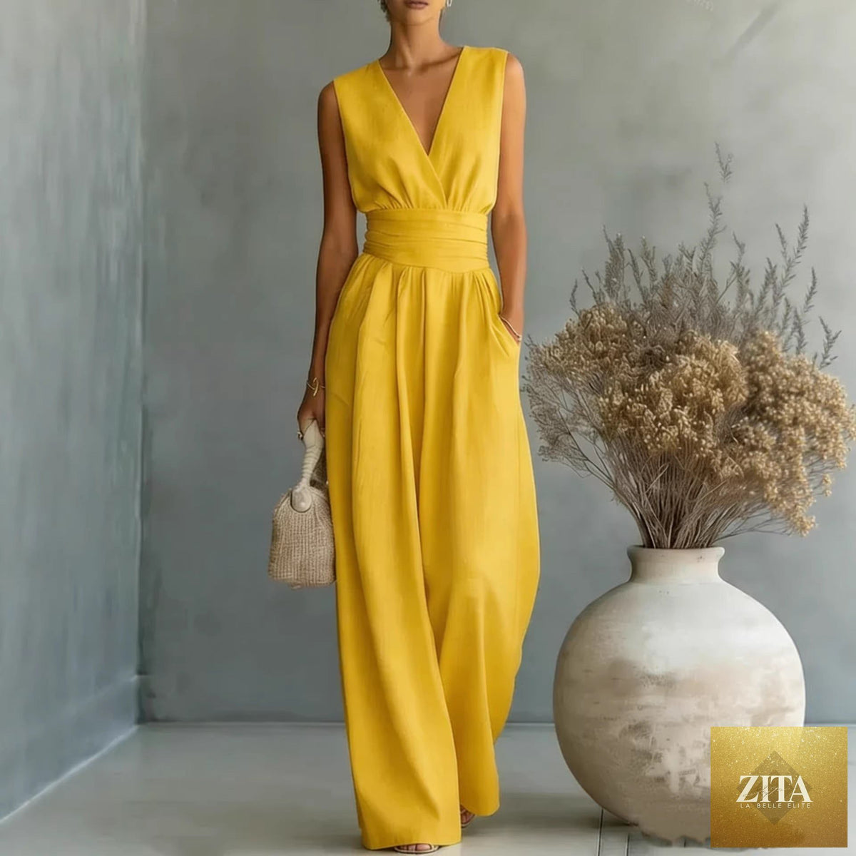 Women's elegant V-neck sleeveless jumpsuit by Zita La Belle Elite, featuring a waist-cinching fit and straight-leg casual style.