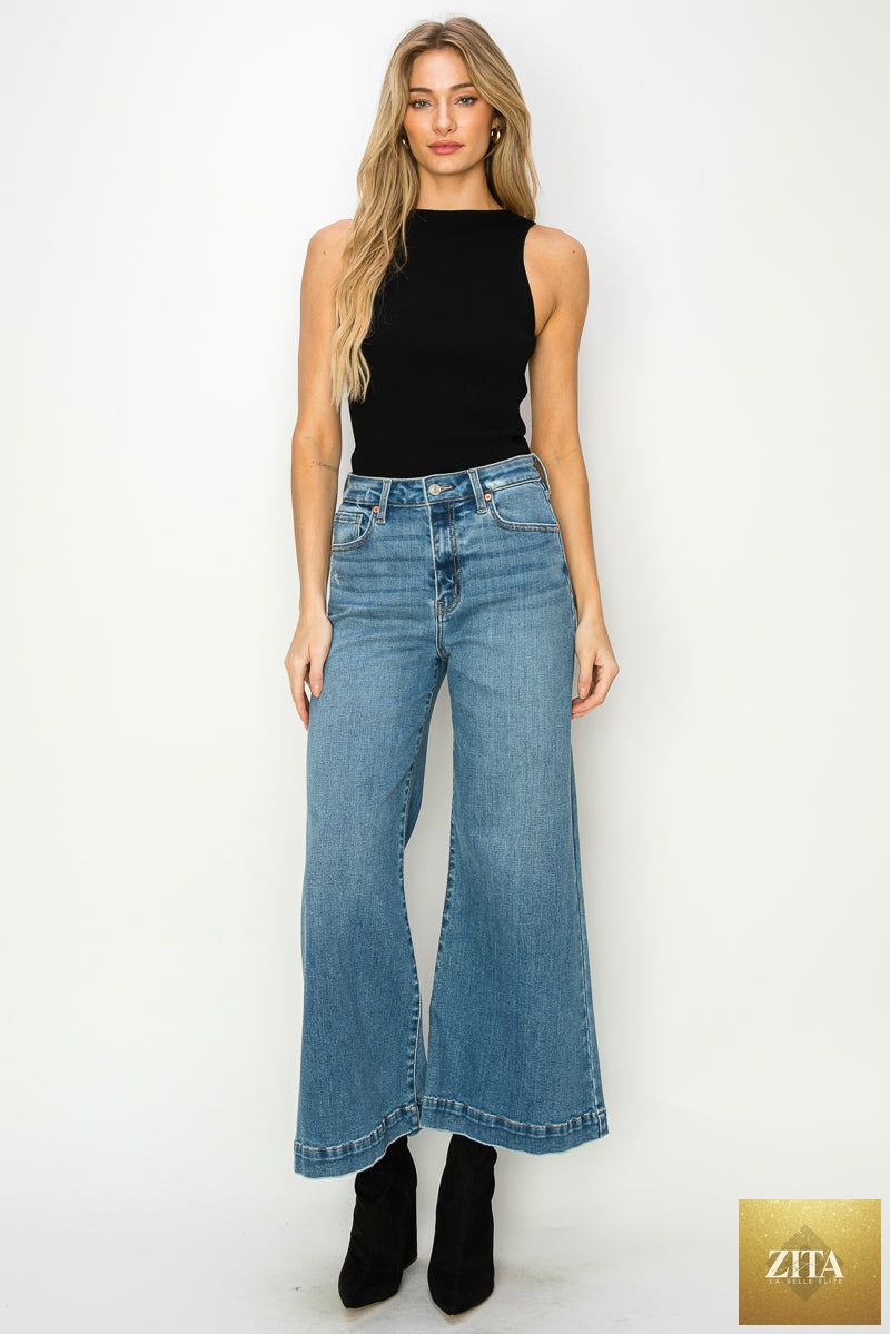 Artemis Vintage Noa high-rise crop palazzo jeans with wide-leg fit and classic denim wash, styled with pockets and belt loops.