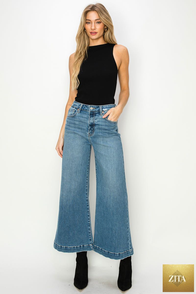 Artemis Vintage Noa high-rise crop palazzo jeans in denim with wide legs and a high waist, styled for a casual look.