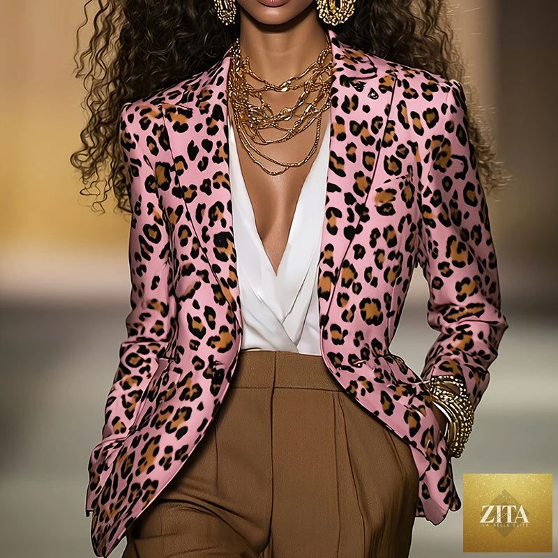 Women's pink leopard blazer by FitiqueFit, casualwear style, shown on a hanger with a tailored fit and vibrant animal print pattern.