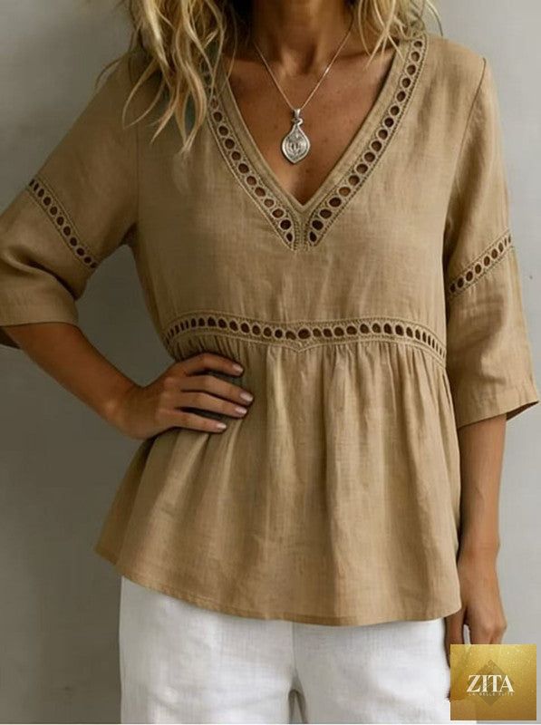 Women's V-neck hollow-out fringe cotton-linen top by Zita La Belle Elite, casualwear featuring stylish V-neck and fringe details.