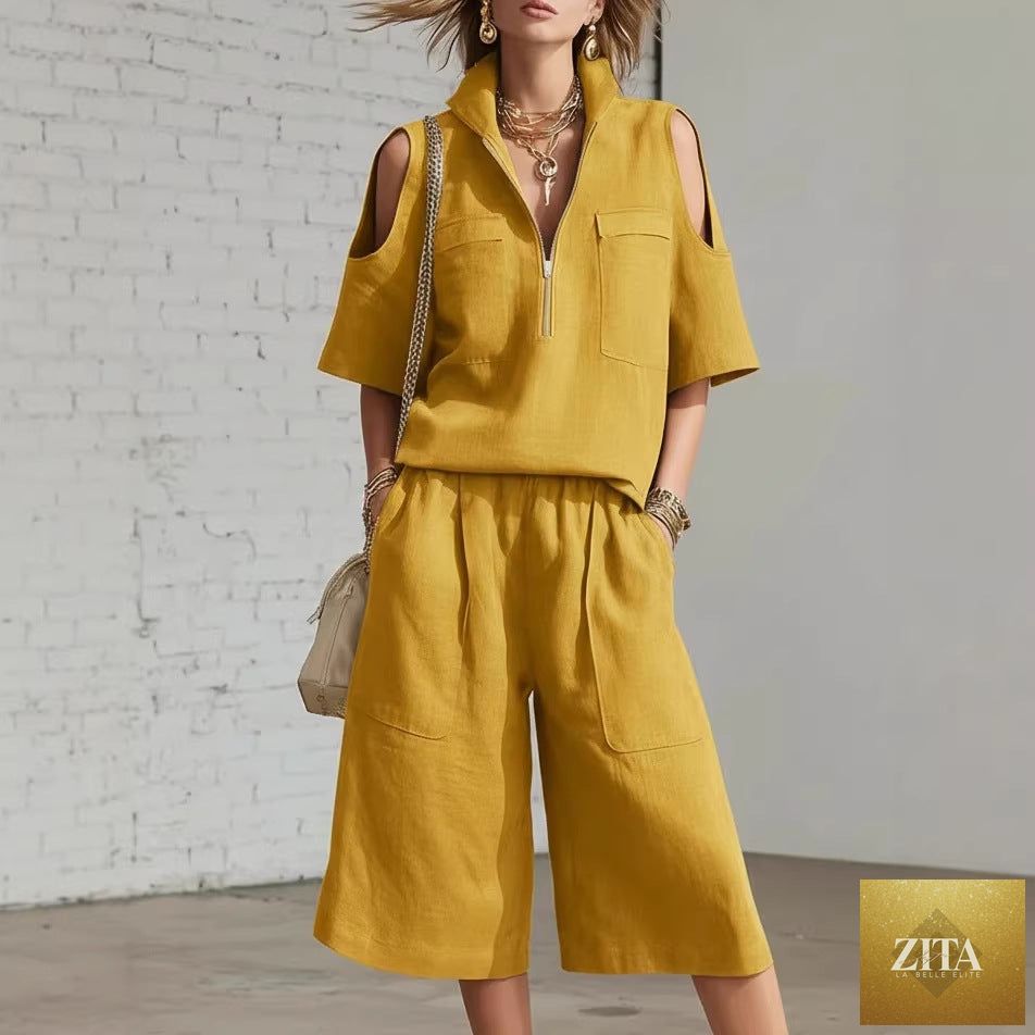 MERIDGE two-piece set with short-sleeve shirt and loose shorts, casual and comfortable for everyday wear.