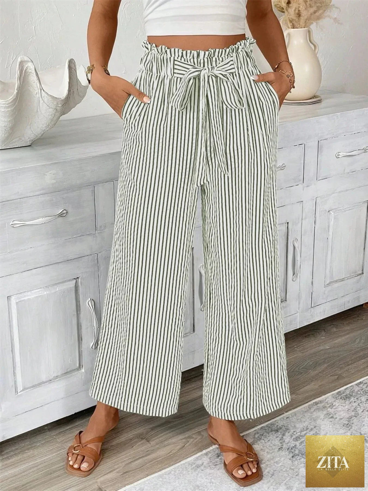 SITRA full size striped wide-leg paper bag pants in plus size with high waist and relaxed fit, featuring vertical stripe pattern.