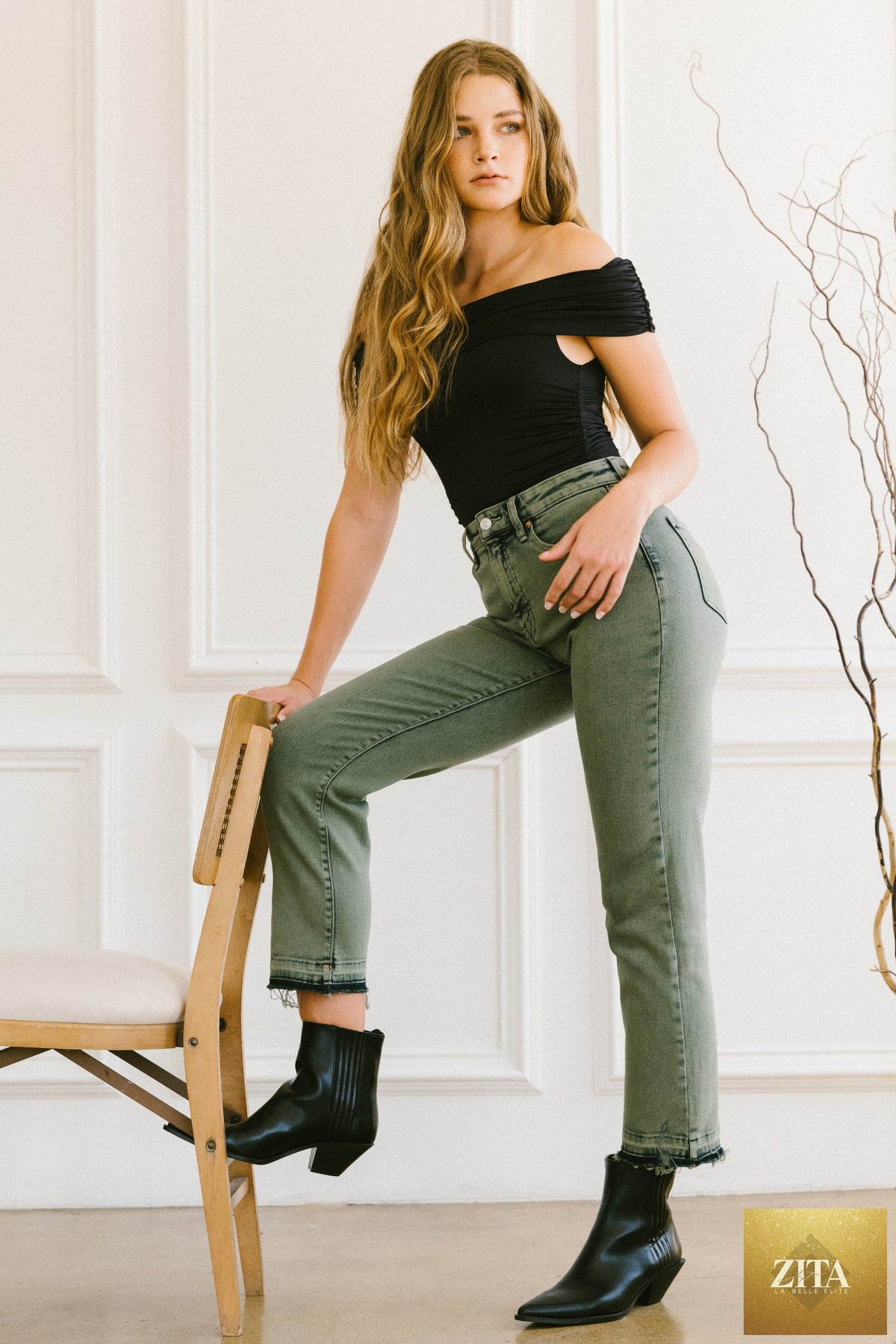 Artemis Vintage Elena Tummy Control High Rise Straight Jeans displayed on a model, showcasing classic denim style and fit.