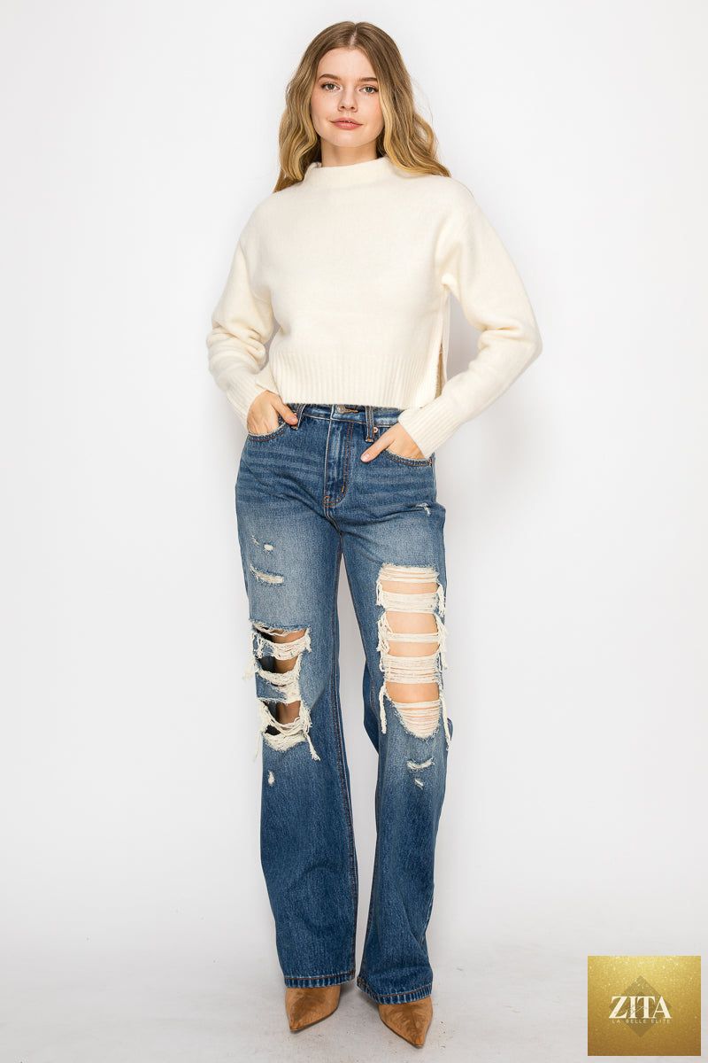 Artemis Vintage hybrid stretch ripped flare jeans showing distressed details and fitted waist on a model.