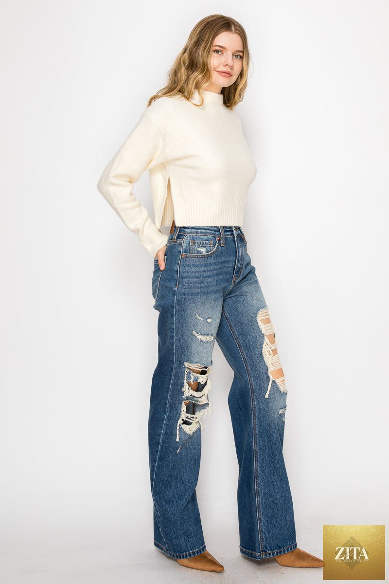 Artemis Vintage hybrid stretch ripped flare jeans with distressed details and a fitted high waist, shown on a model.
