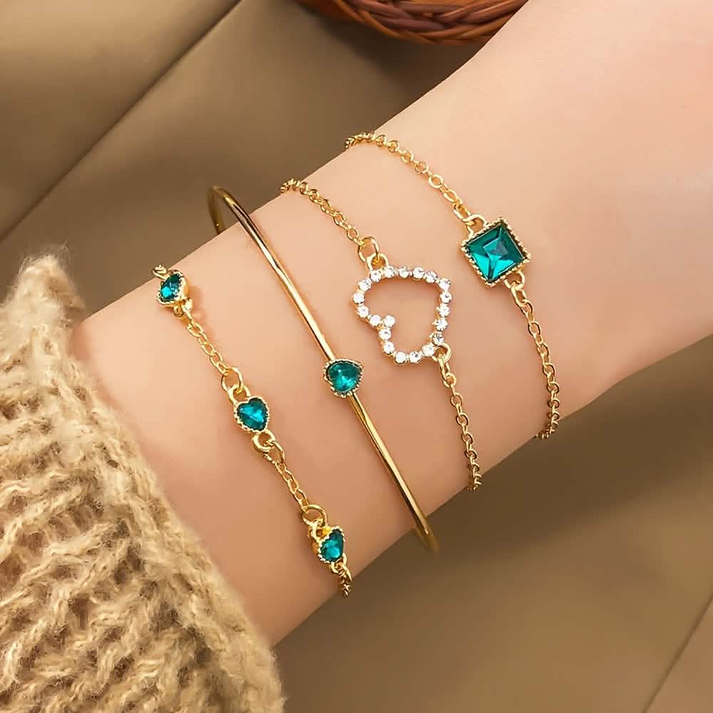 Set of 4 rhinestone alloy bracelets featuring minimalist heart and square designs, perfect for stylish jewelry accessories.