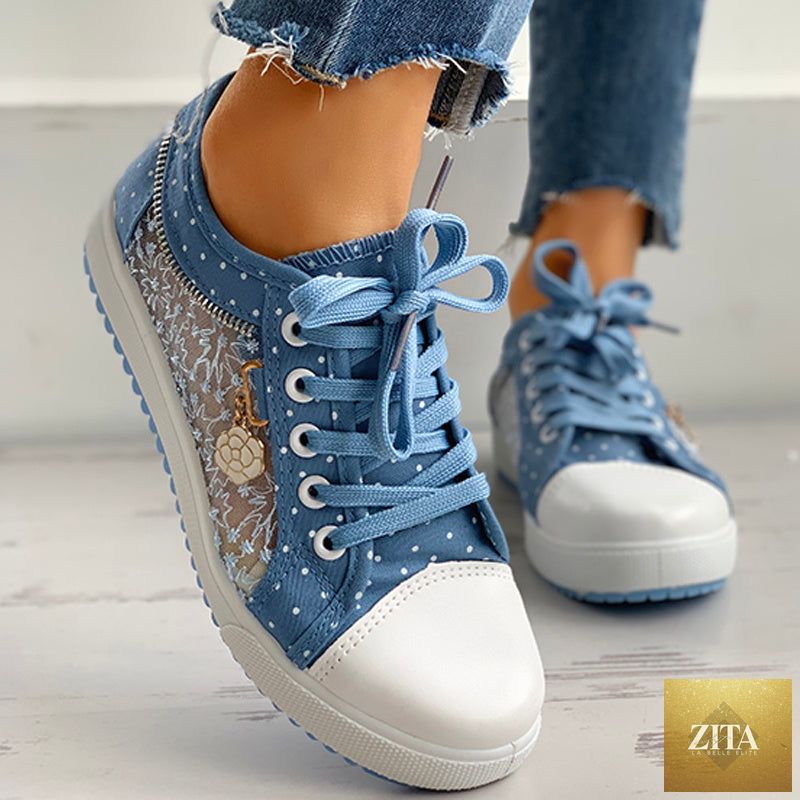 Women's floral embroidered polka dot print canvas sneakers by FitiqueFit, casual footwear with colorful embroidered flower details.