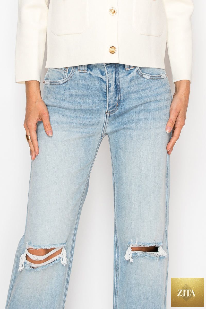 Artemis Vintage tummy control high-rise relaxed straight-leg jeans shown on a model, featuring classic denim fabric and a comfortable fit.