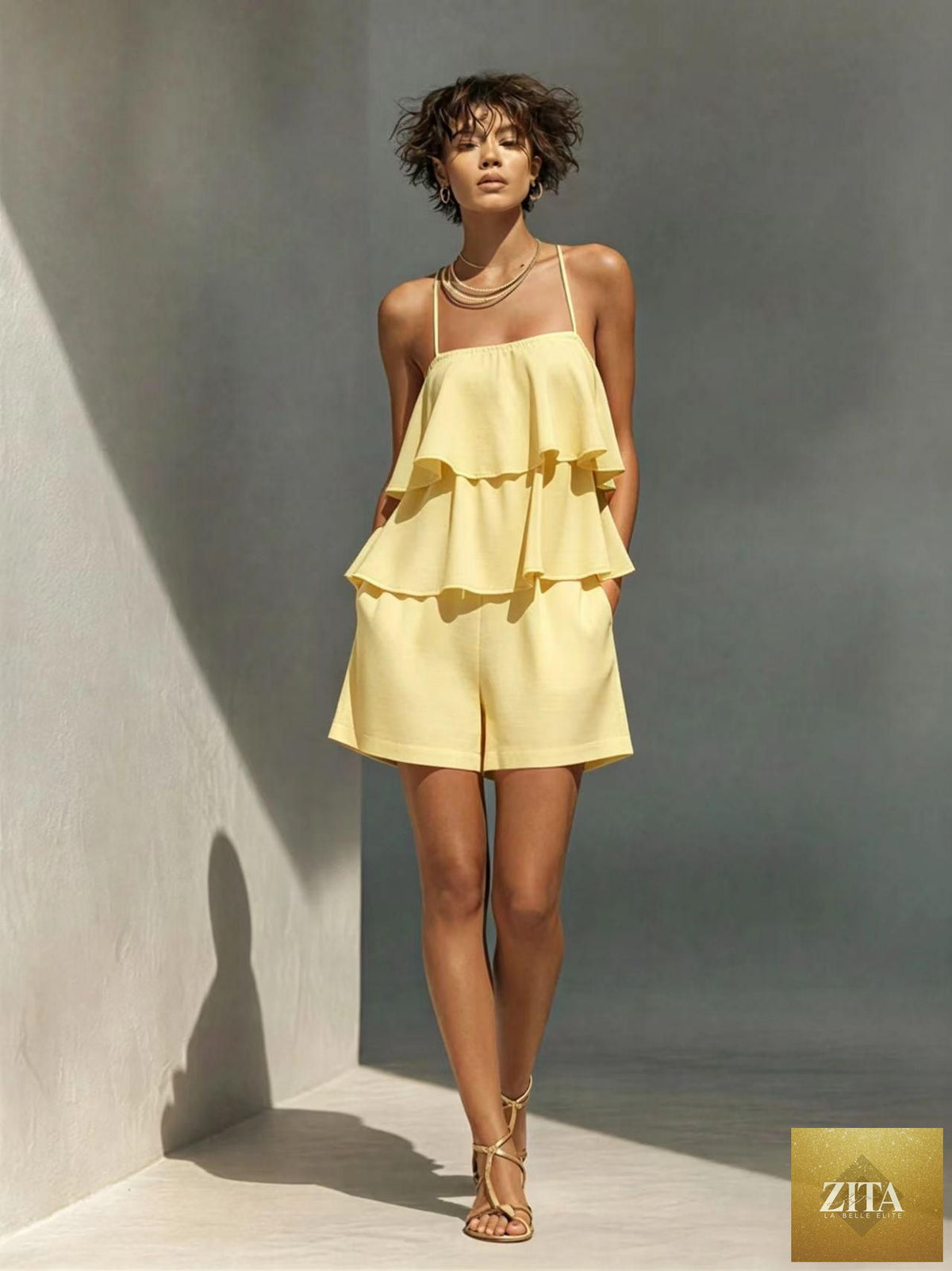 Women's multi-layer ruffle camisole and shorts set by Zita La Belle Elite, casualwear with floral ruffle details and lightweight fabric.