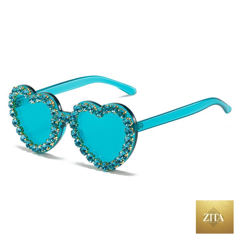 Peach heart-shaped rhinestone sunglasses in Y2K INS style, trendy eyewear by FitiqueFit with sparkling embellishments.