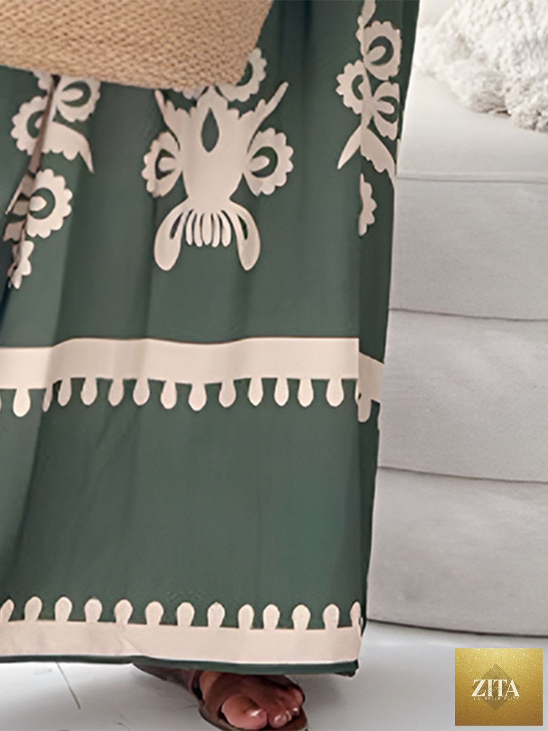 Stevvex sleeveless maxi dress with unique printed spaghetti straps, elegant summer style, flowing fabric, and vibrant design.